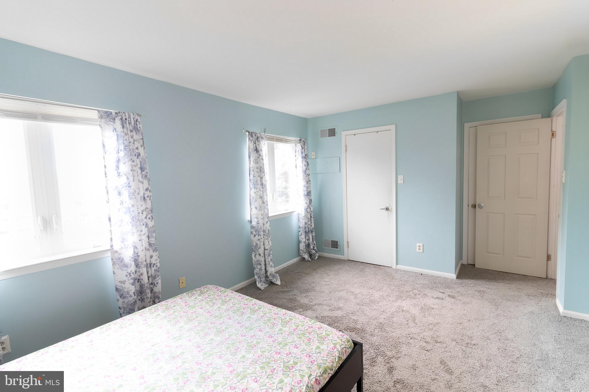 123 Caernarvon Court Exton, PA 19341 - Photo 11 of 26 a big room with windows and closet