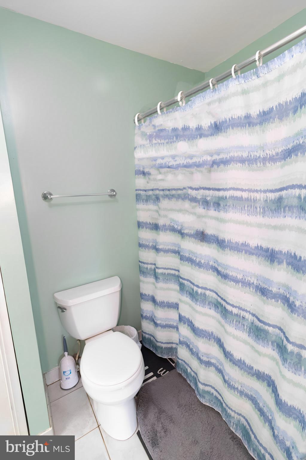 123 Caernarvon Court Exton, PA 19341 - Photo 15 of 26 a bathroom with a toilet and a shower
