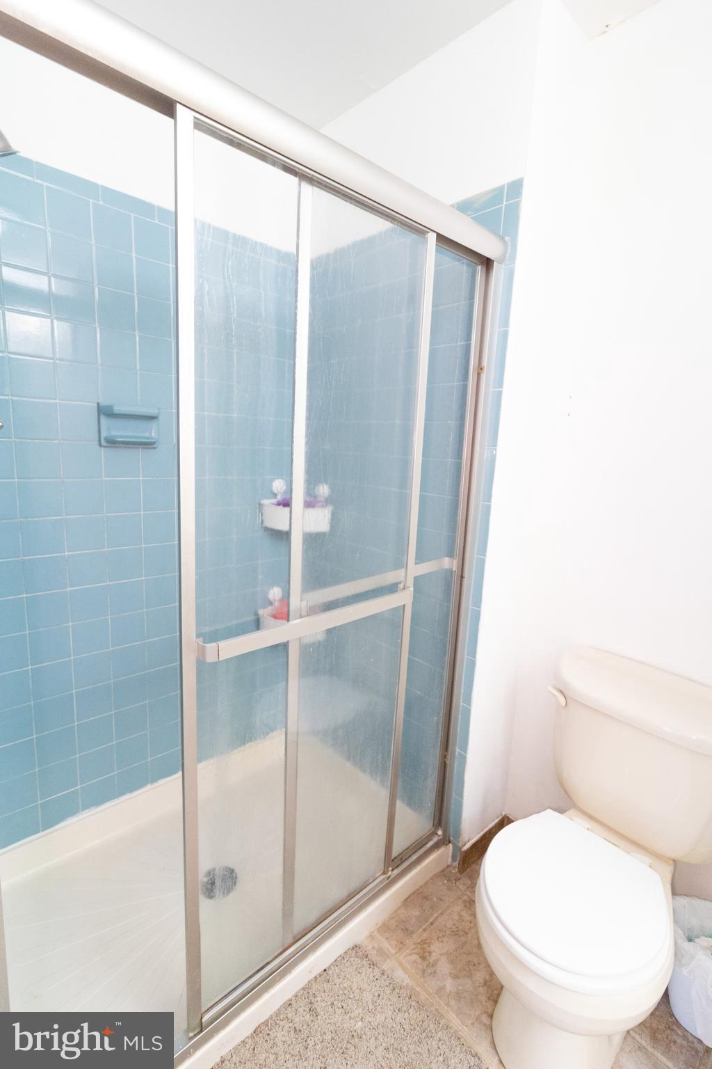 123 Caernarvon Court Exton, PA 19341 - Photo 20 of 26 a bathroom with a toilet and a shower