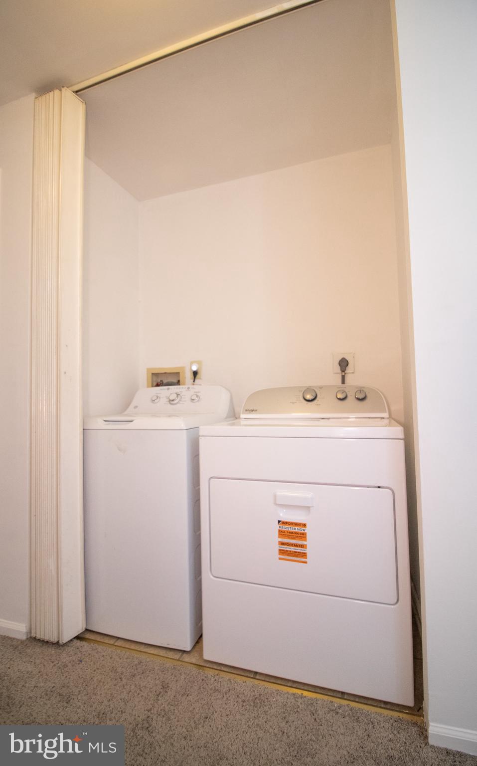 123 Caernarvon Court Exton, PA 19341 - Photo 22 of 26 a utility room with dryer and washer