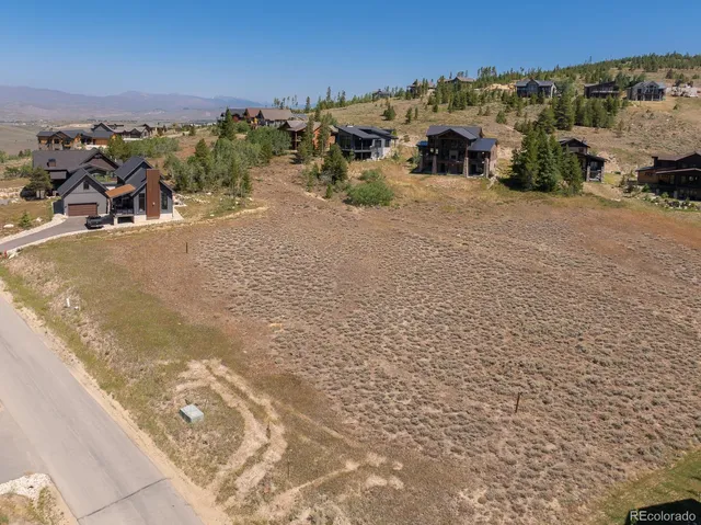 an aerial view of a city with lots of residential buildings
