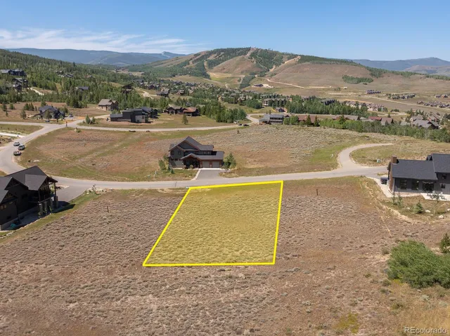 a view of a terrace with yard and mountain view