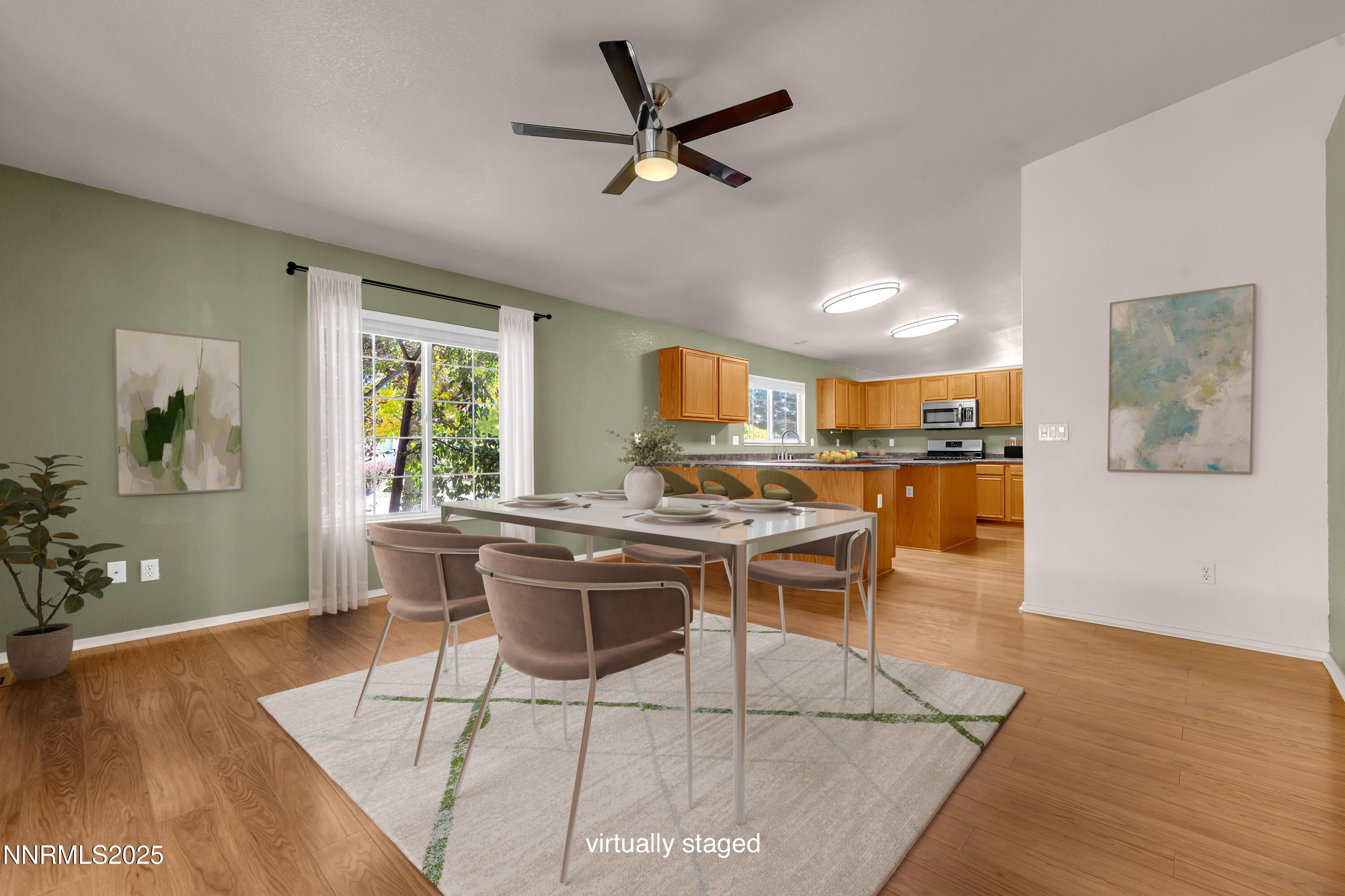 17507 Bear Lake Drive Reno, NV 89508 - Photo 15 of 42 a living room with furniture and a wooden floor