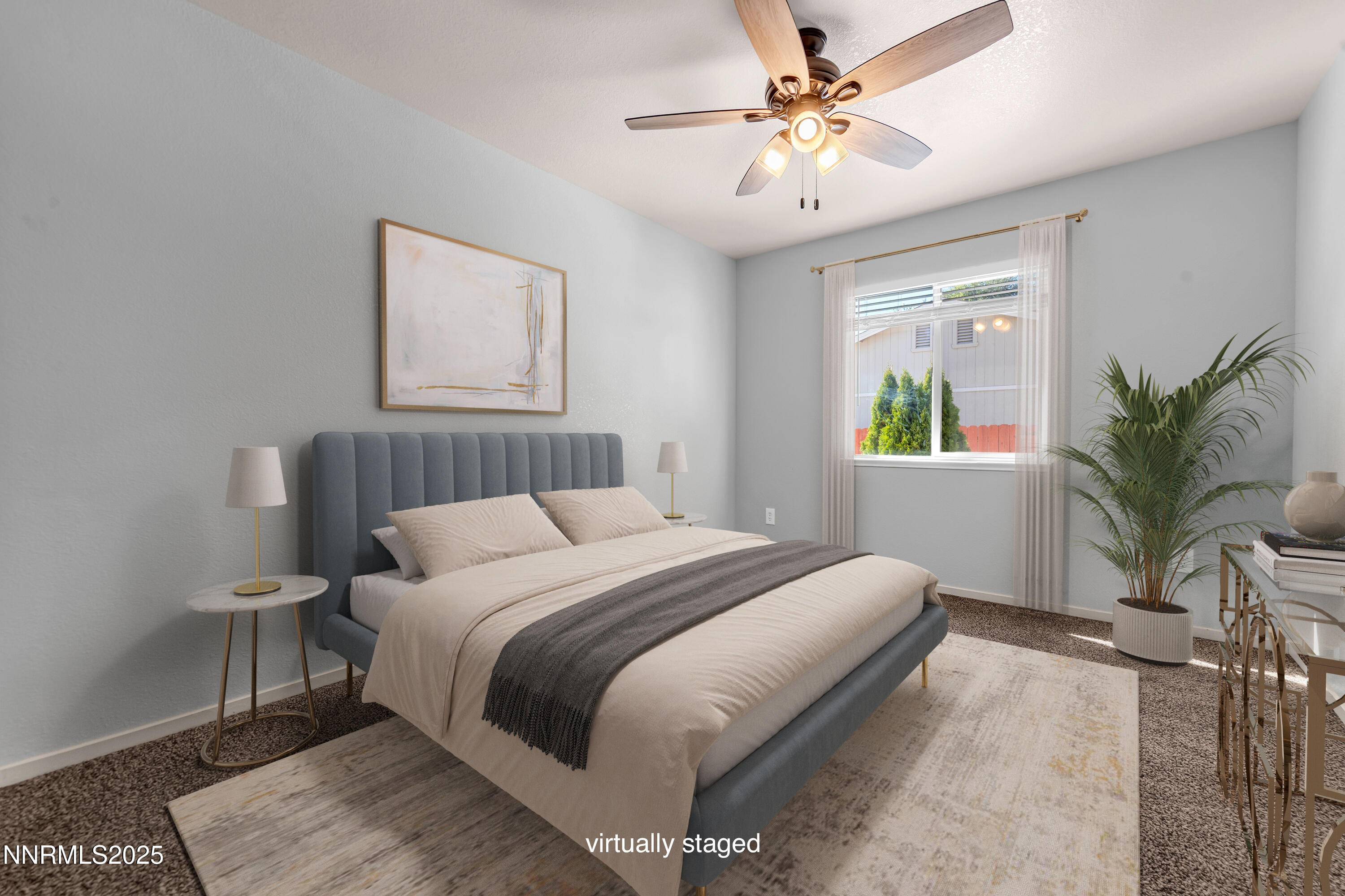 17507 Bear Lake Drive Reno, NV 89508 - Photo 29 of 42 a bedroom with a bed and a chandelier