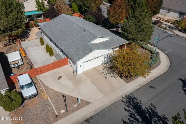 an aerial view of a house having yard