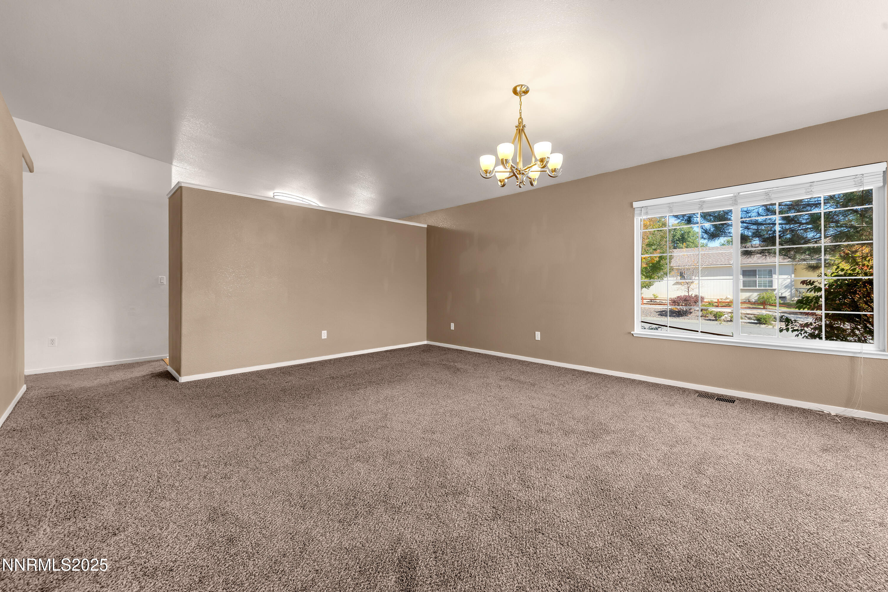 17507 Bear Lake Drive Reno, NV 89508 - Photo 7 of 42 a view of an empty room with a window