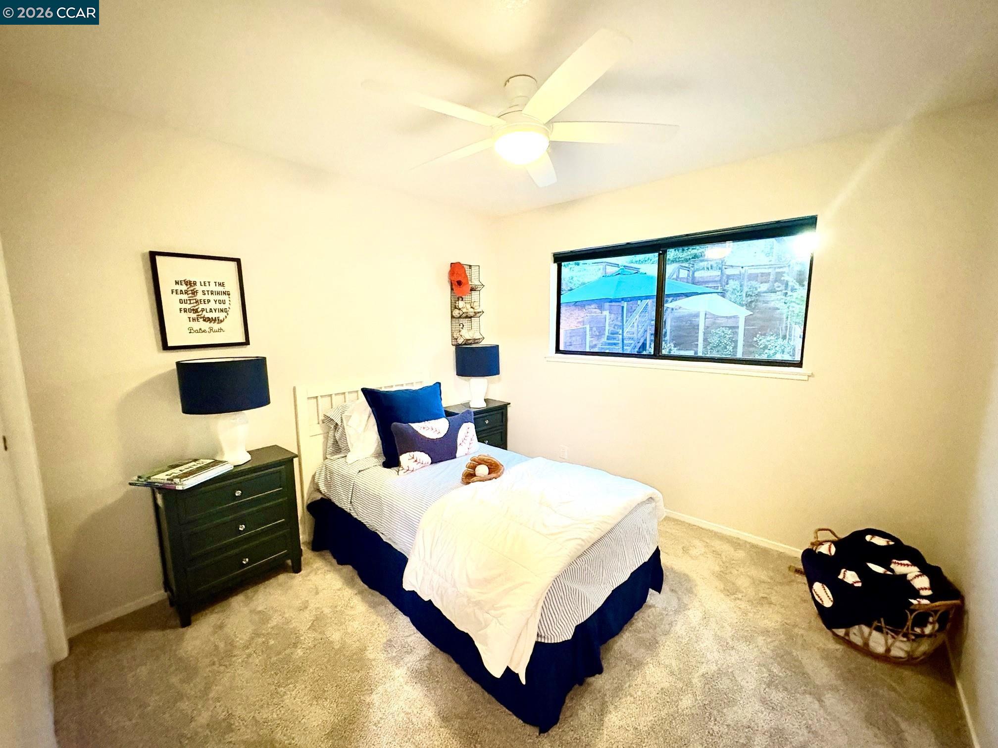 2589 Pebble Beach Loop Lafayette, CA 94549 - Photo 22 of 32 a bedroom with a bed and a painting on the wall