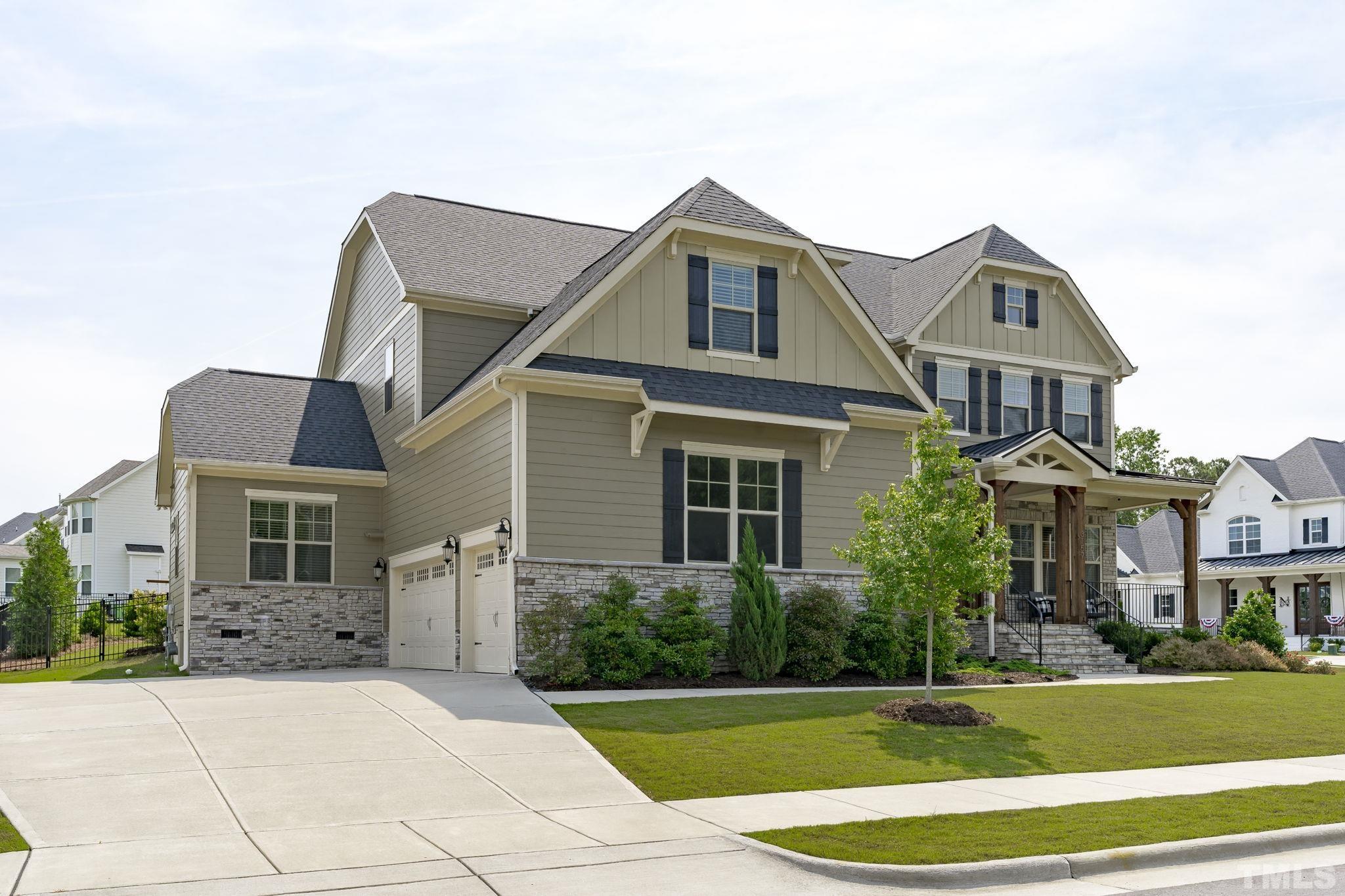3157 Beechcroft Lane Apex, NC 27502 - Photo 2 of 42 a front view of a house with a yard