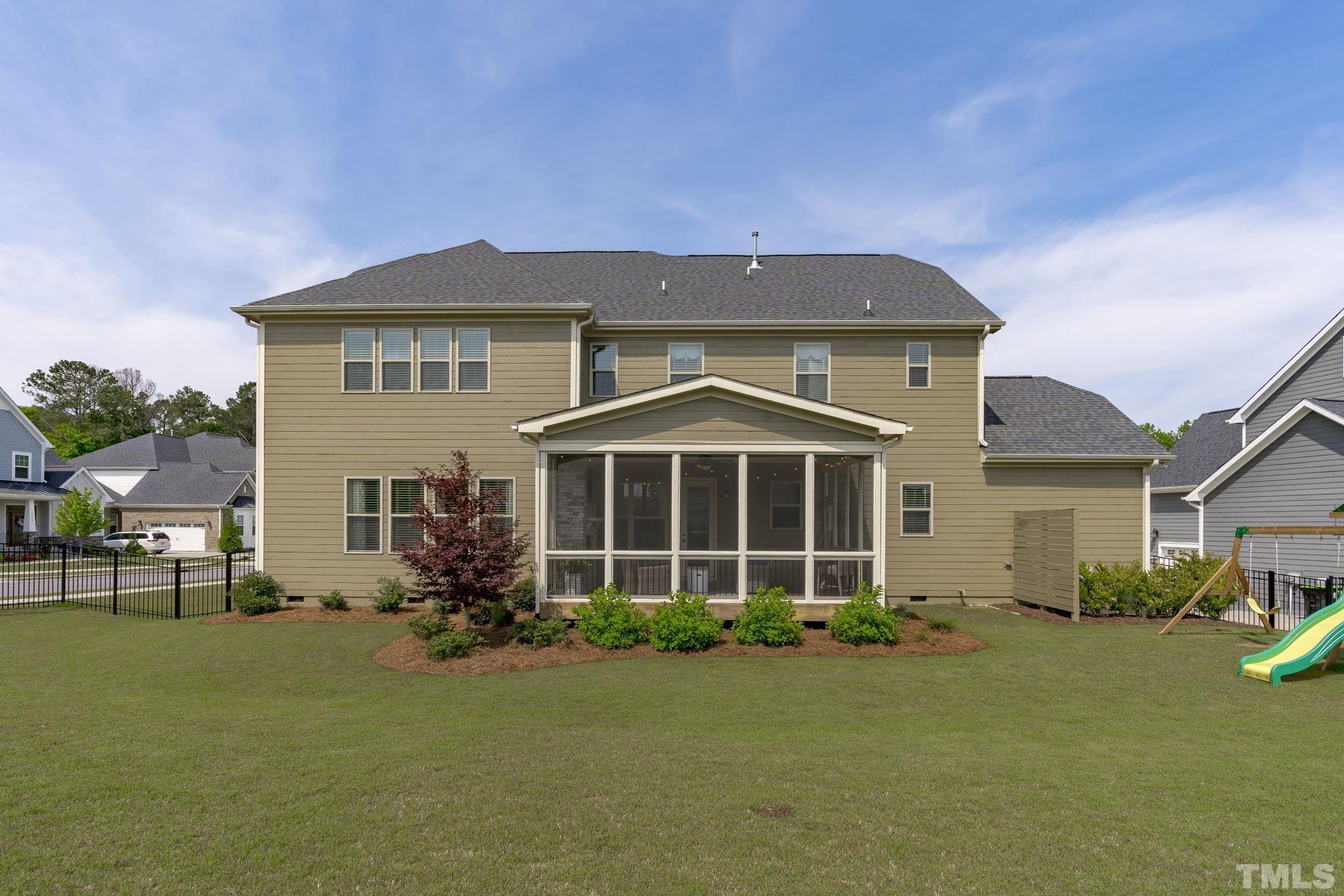 3157 Beechcroft Lane Apex, NC 27502 - Photo 38 of 42 a front view of a house with garden