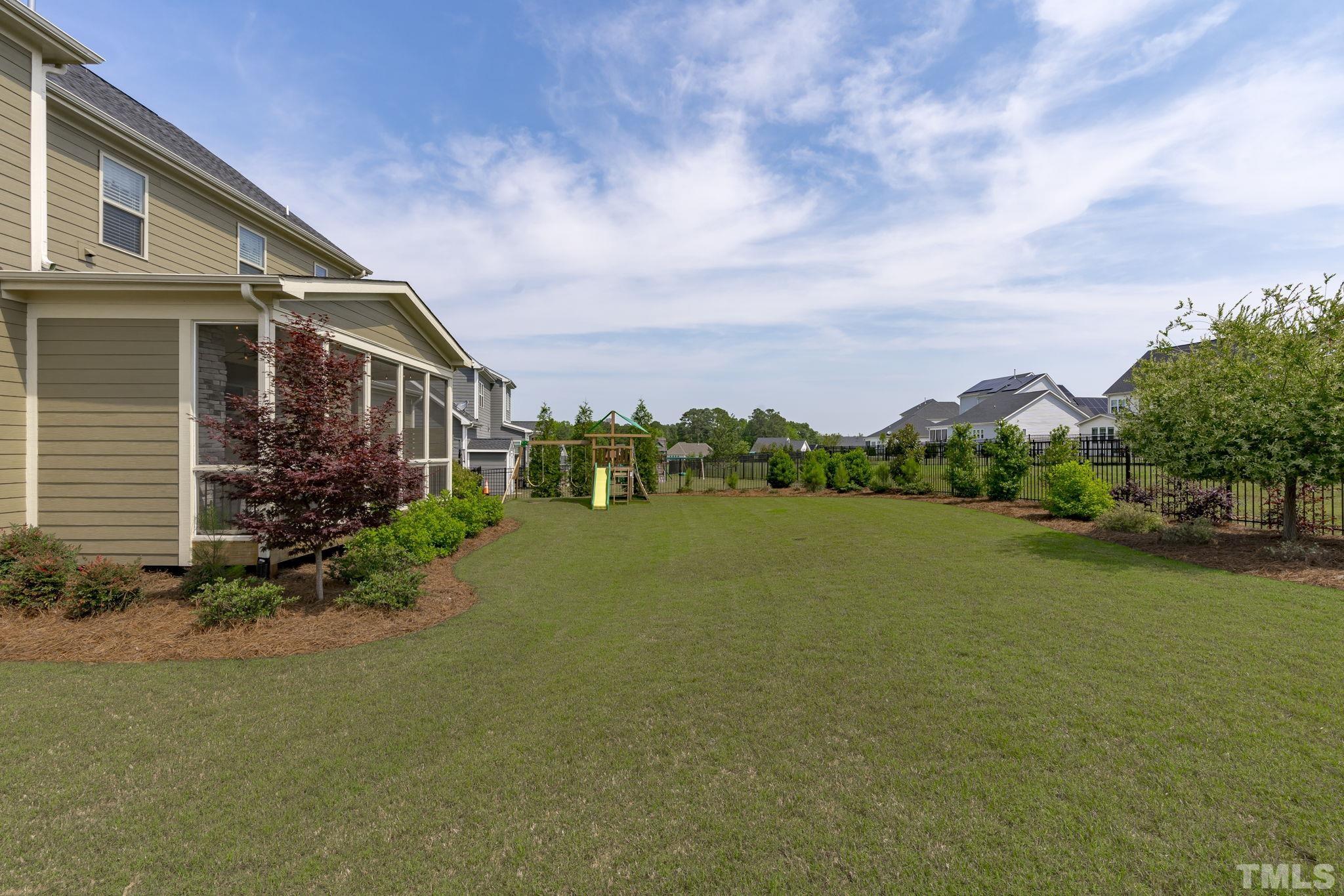 3157 Beechcroft Lane Apex, NC 27502 - Photo 39 of 42 a front view of a house with garden