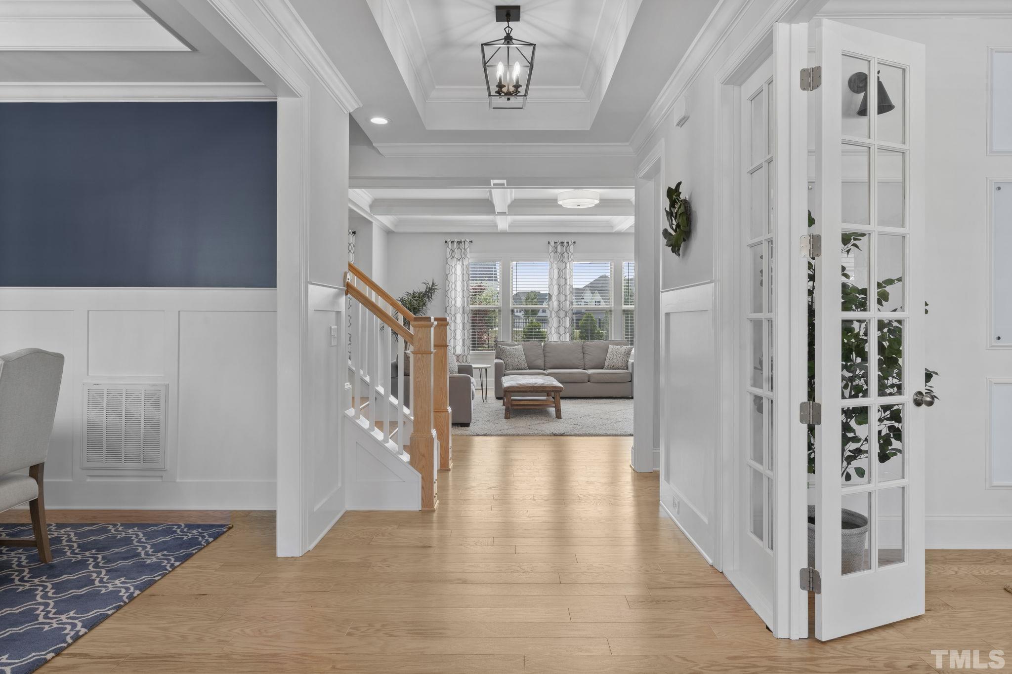 3157 Beechcroft Lane Apex, NC 27502 - Photo 6 of 42 a view of entryway and hall with wooden floor