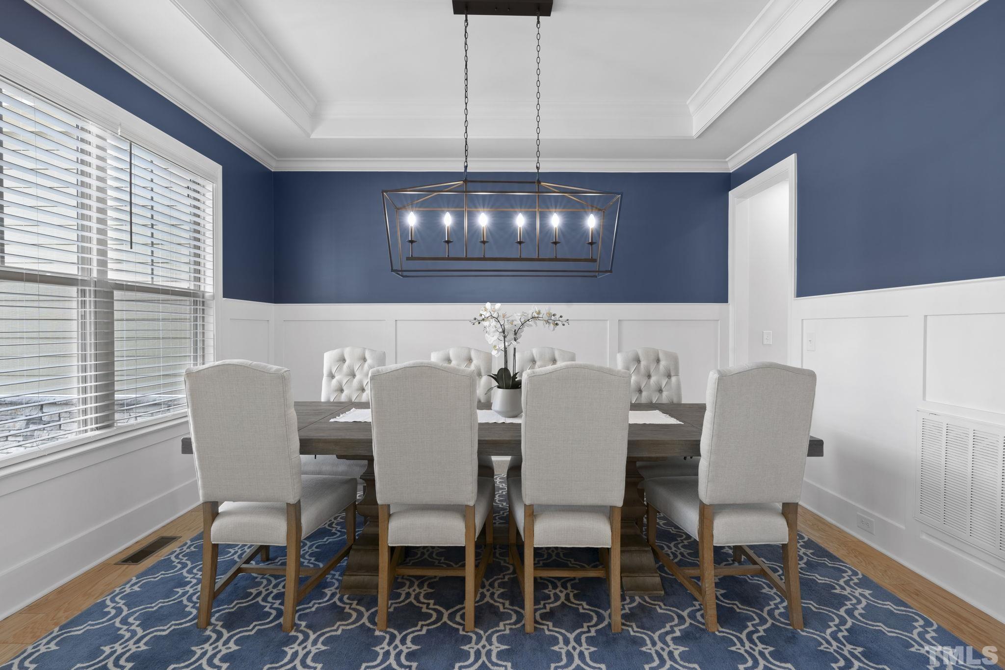 3157 Beechcroft Lane Apex, NC 27502 - Photo 9 of 42 a view of a dining room with furniture window and outside view