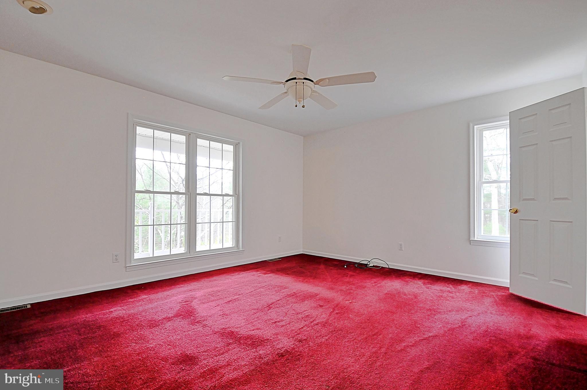 235 Peppermint Spring Lane Winchester, VA 22603 - Photo 51 of 90 an empty room with windows and closet