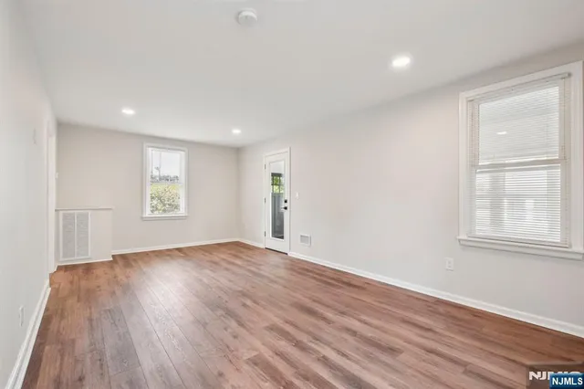 a view of a garage with parked cars