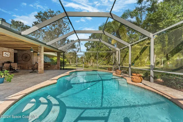 a swimming pool with a yard