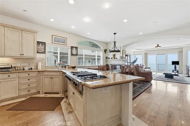 a kitchen with a stove and a sink