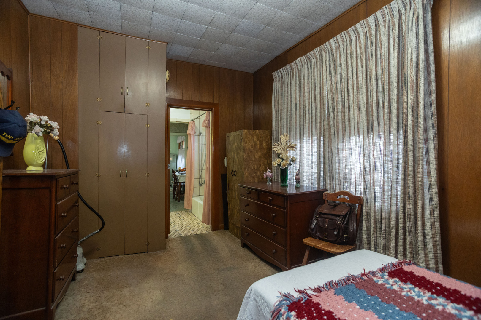 4155 West Grace Street Chicago, IL 60641 - Photo 17 of 30 a bedroom with a bed and a mirror
