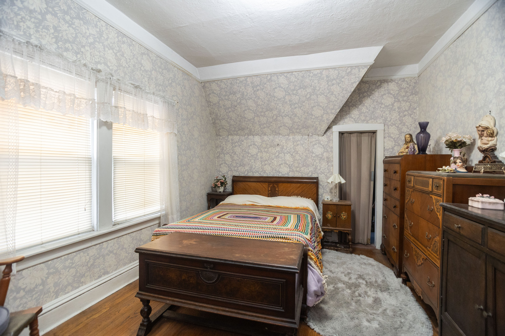 4155 West Grace Street Chicago, IL 60641 - Photo 21 of 30 a bedroom with a bed and a window
