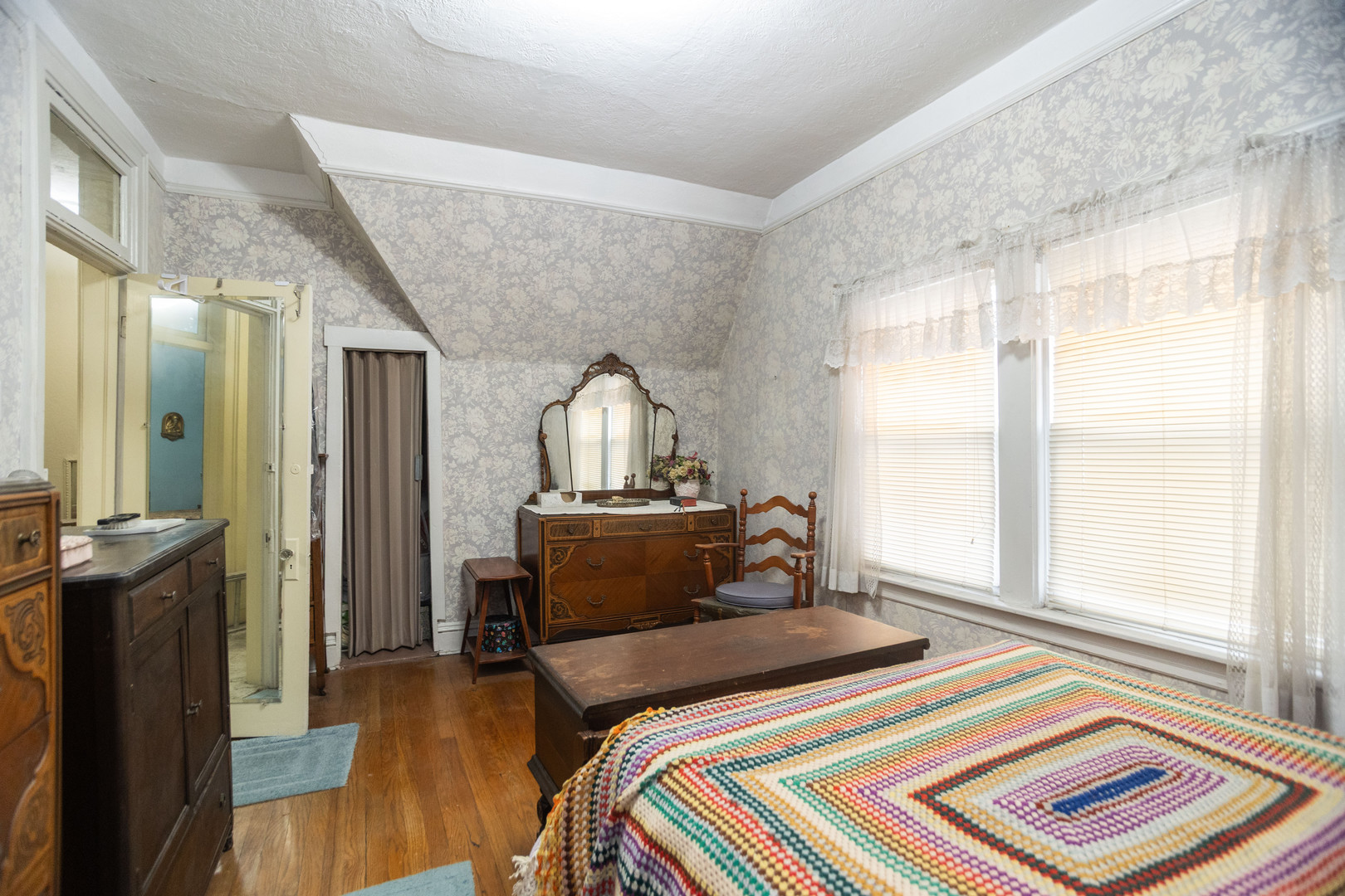 4155 West Grace Street Chicago, IL 60641 - Photo 22 of 30 a bedroom with a bed and wooden floor