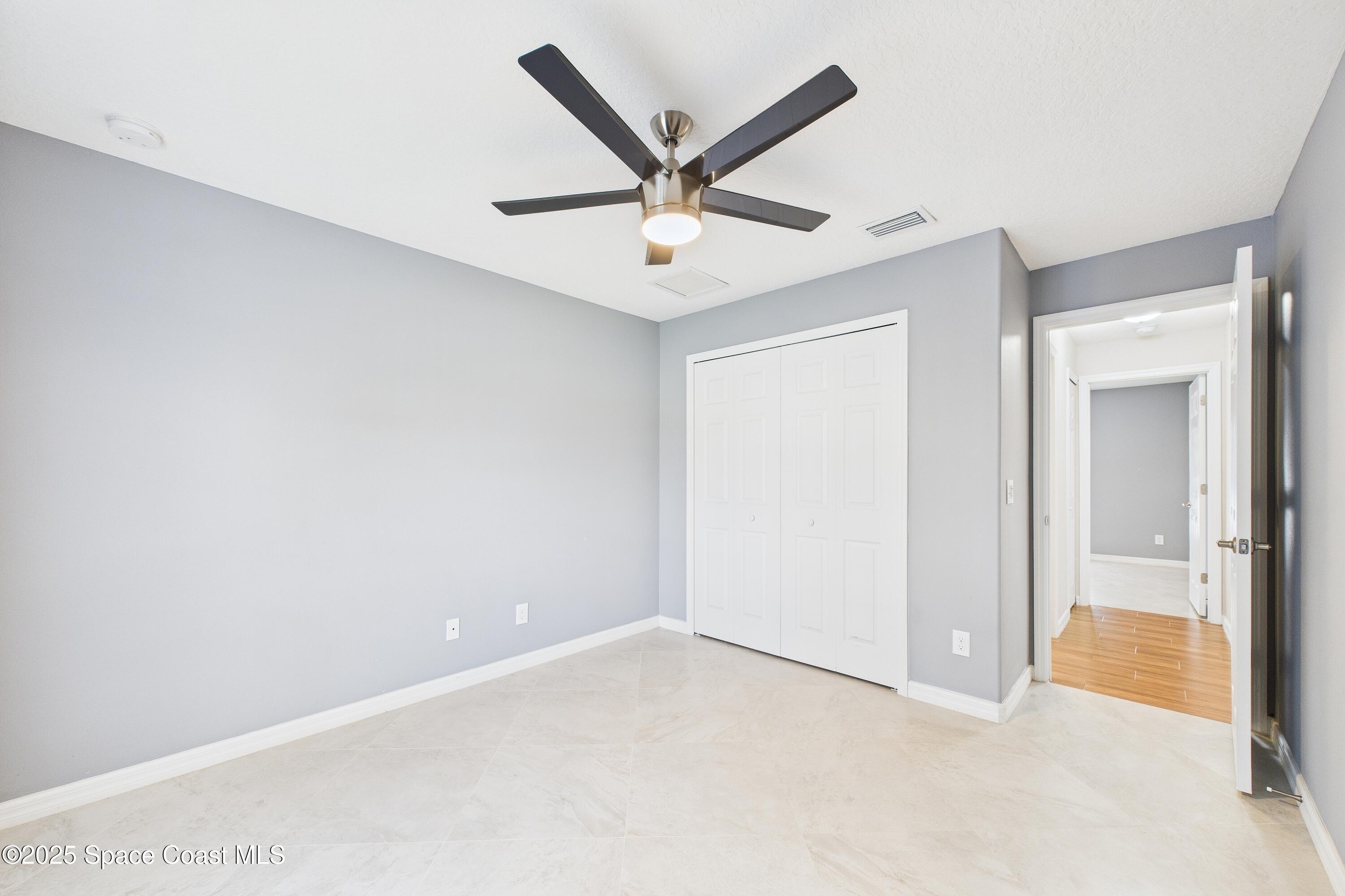 1936 Gloria Circle Palm Bay, FL 32905 - Photo 23 of 50 a view of an empty room
