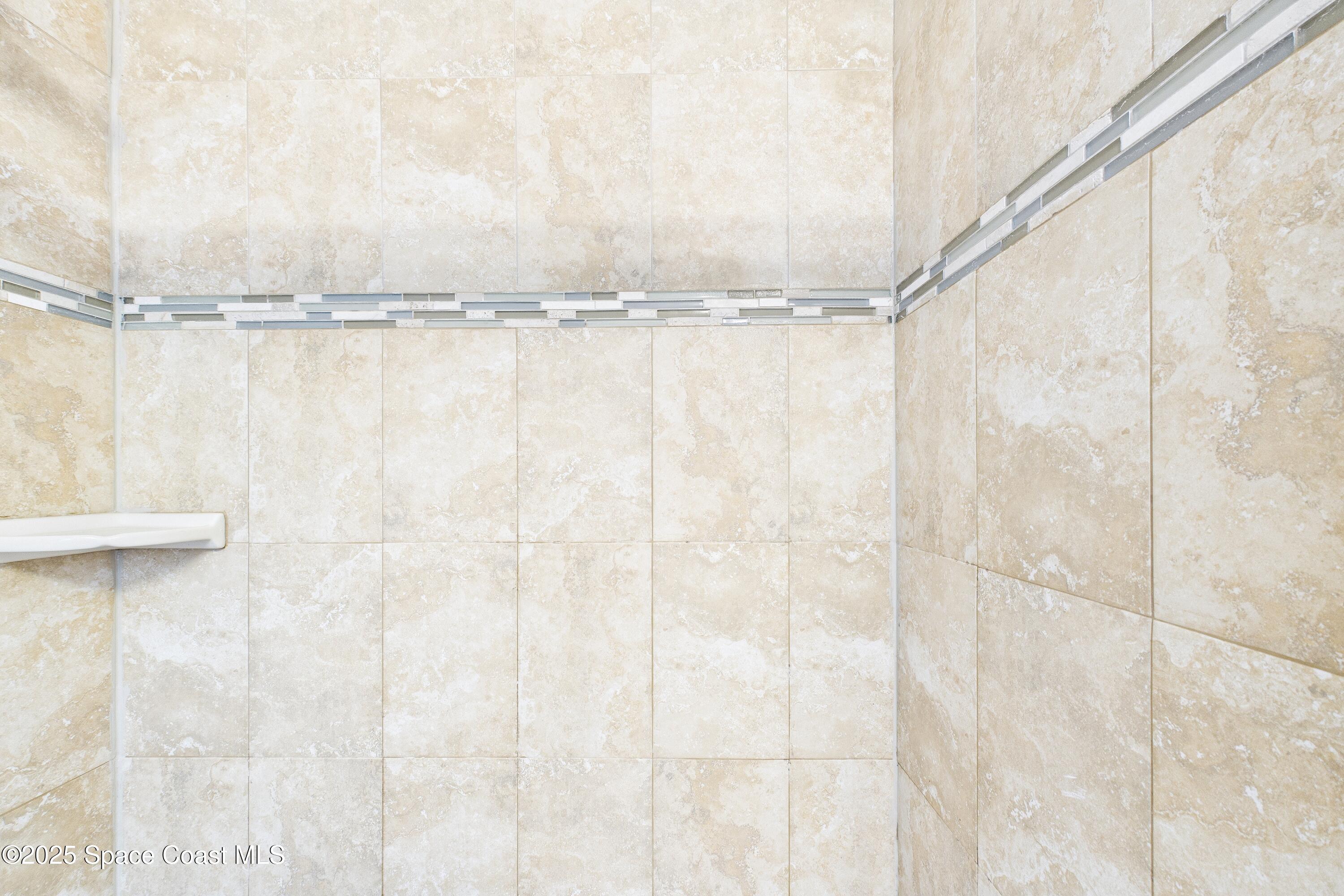 1936 Gloria Circle Palm Bay, FL 32905 - Photo 32 of 50 a bathroom with a shower