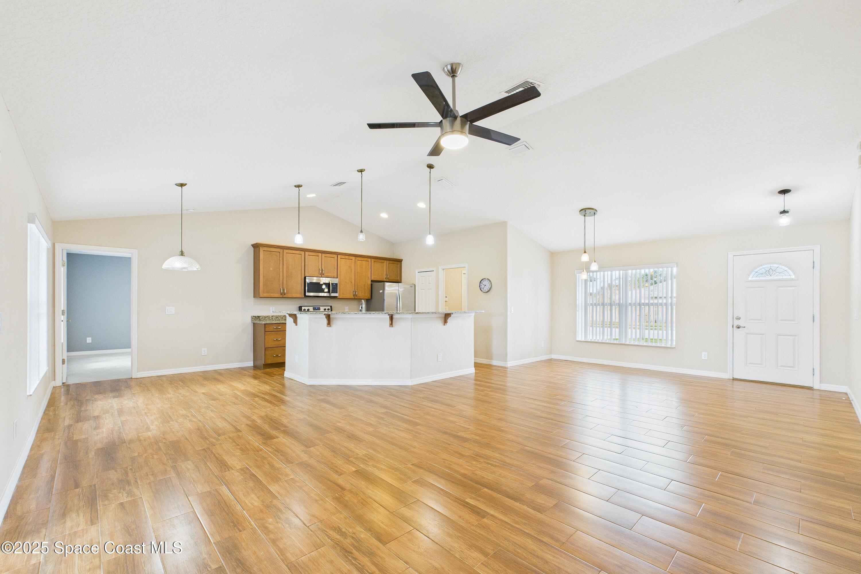 1936 Gloria Circle Palm Bay, FL 32905 - Photo 5 of 50 a view of a kitchen with a sink and a window