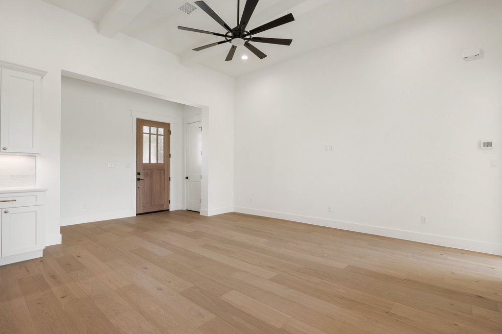 501 Ranchview Drive Johnson City, TX 78636 - Photo 4 of 28 wooden floor in an empty room