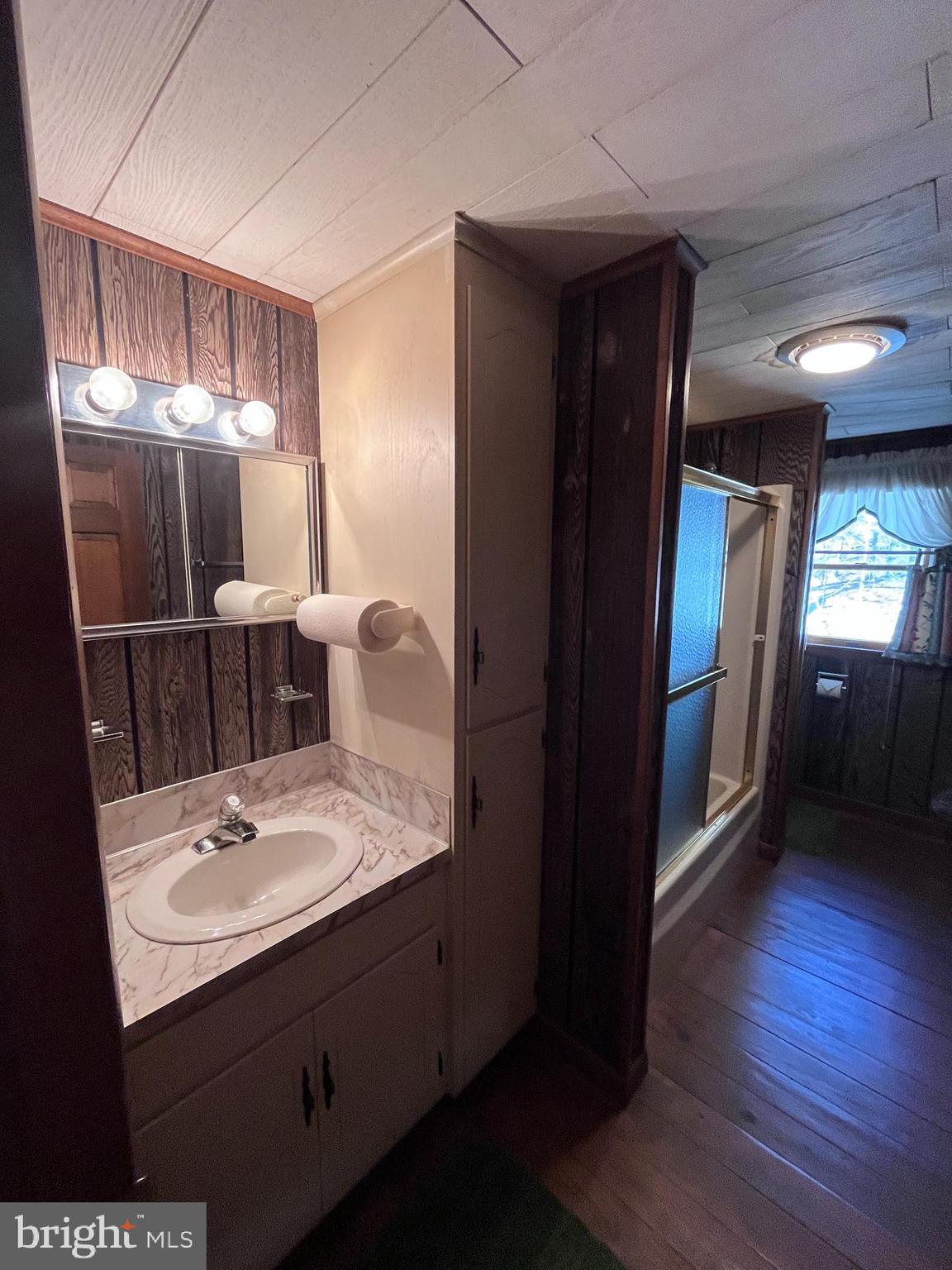 1343 Houser Road Fayetteville, PA 17222 - Photo 19 of 58 a bathroom with a double vanity sink and mirror