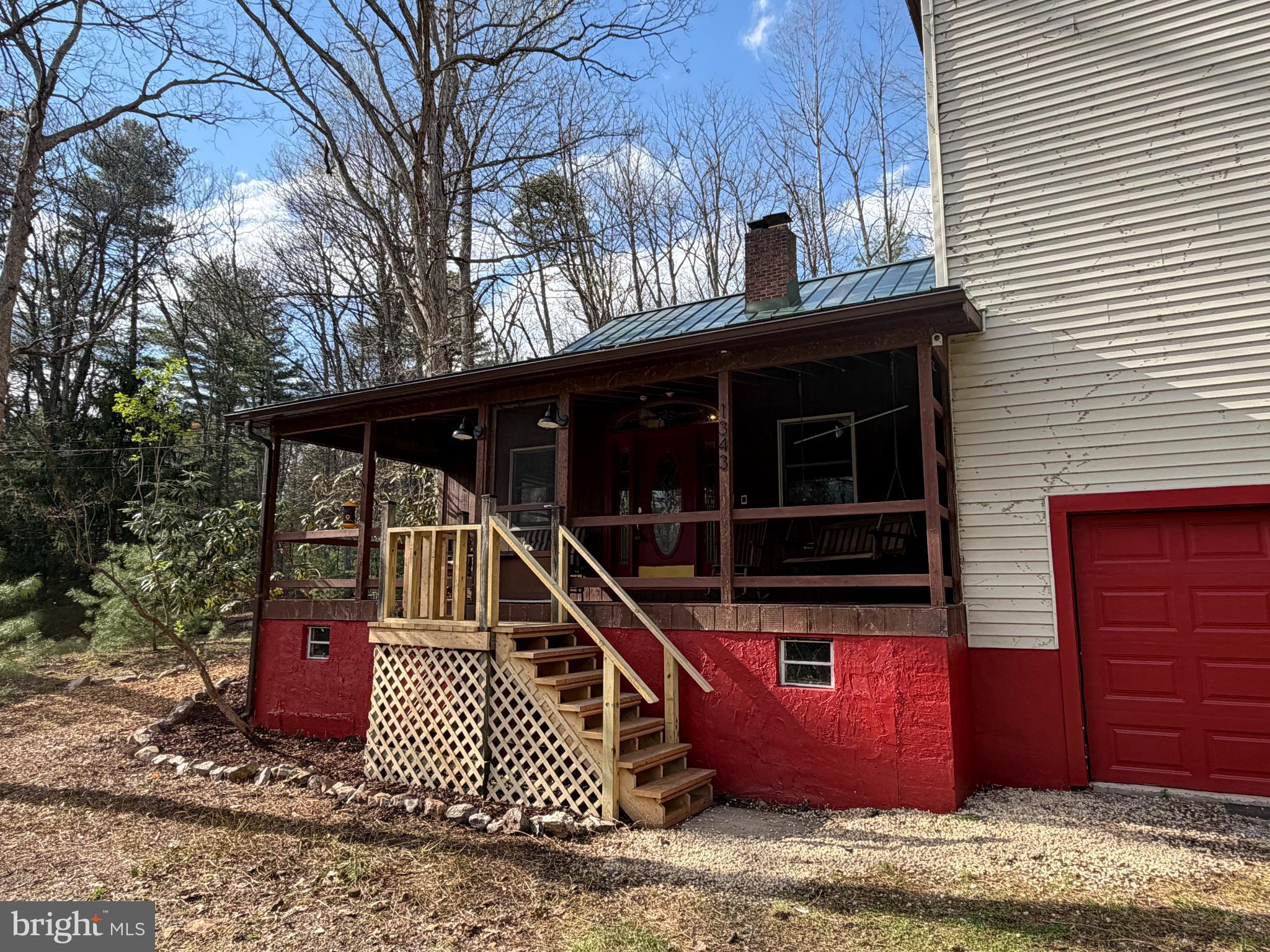 1343 Houser Road Fayetteville, PA 17222 - Photo 2 of 58 a front view of a house with parking space