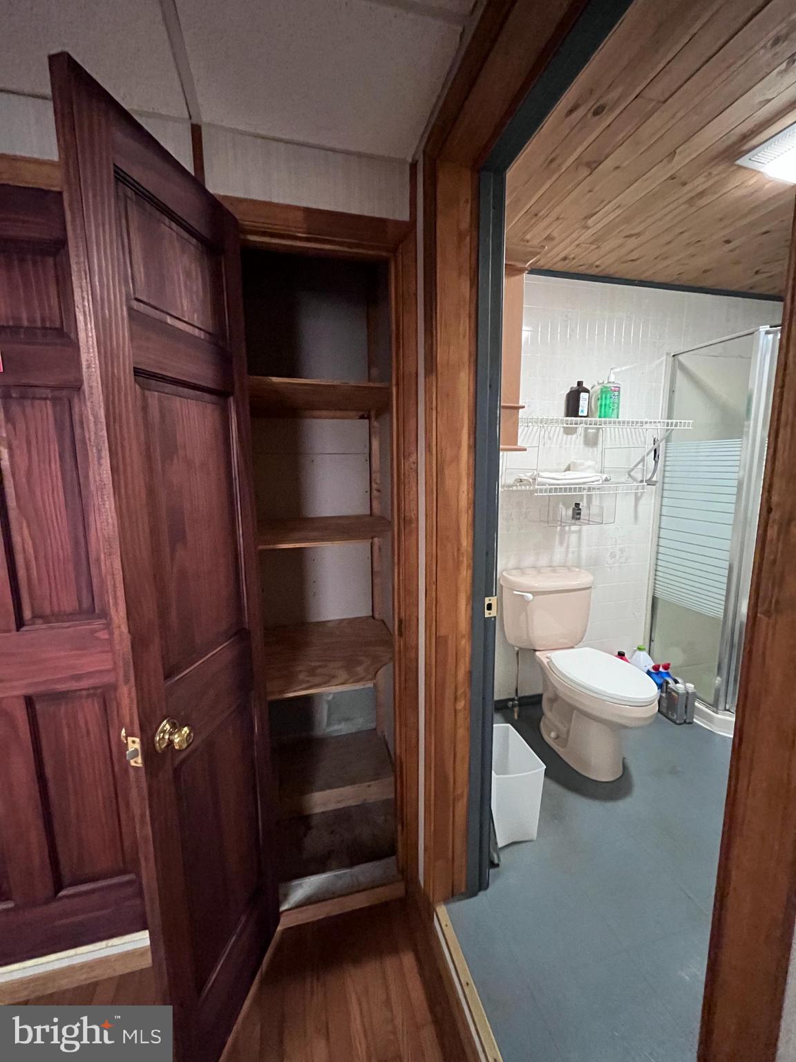 1343 Houser Road Fayetteville, PA 17222 - Photo 36 of 58 a view of walk in closet with clothes and shoes