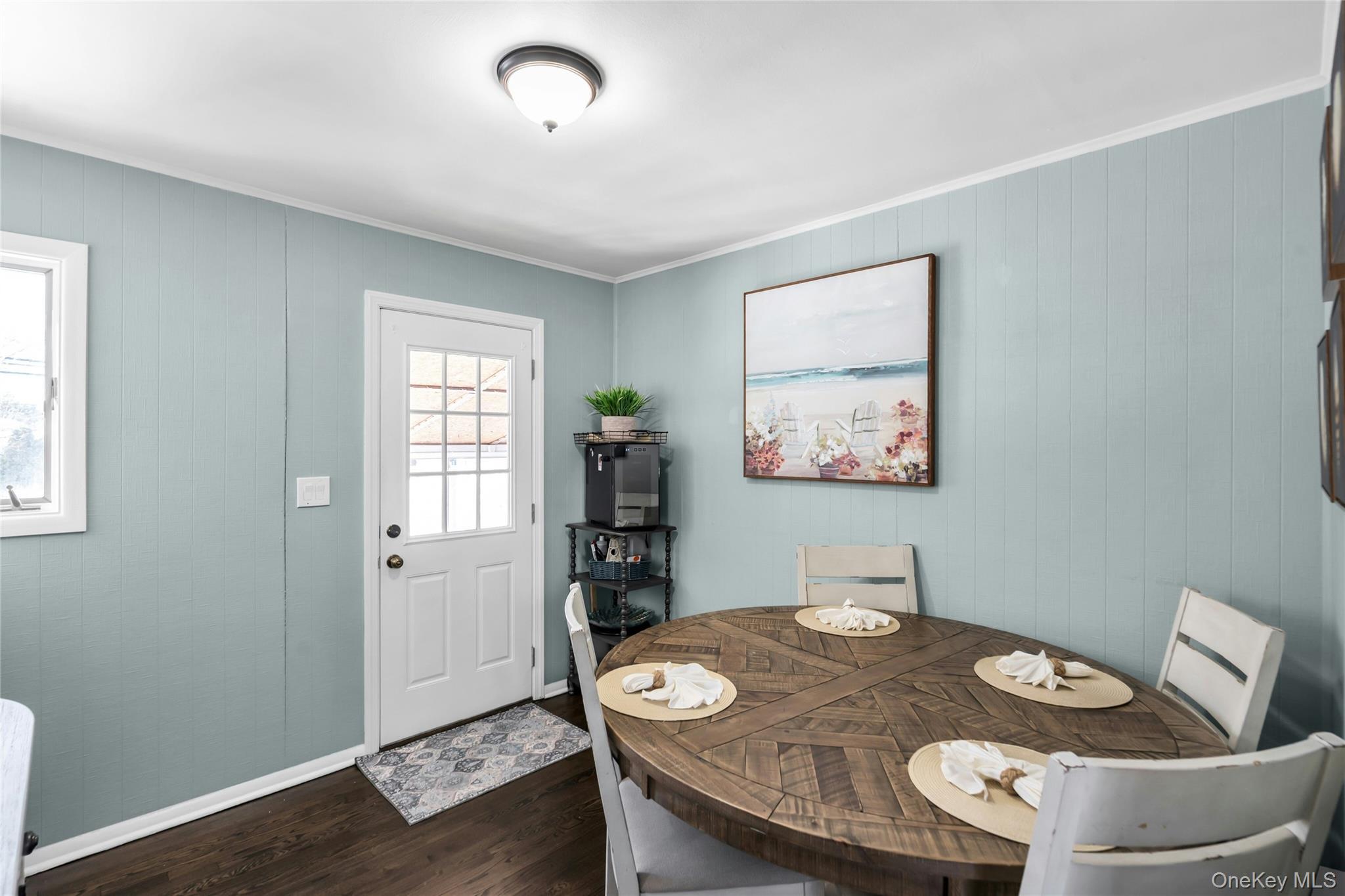 53 Calvert Avenue Commack, NY 11725 - Photo 8 of 25 a view of a dining room with furniture and wooden floor