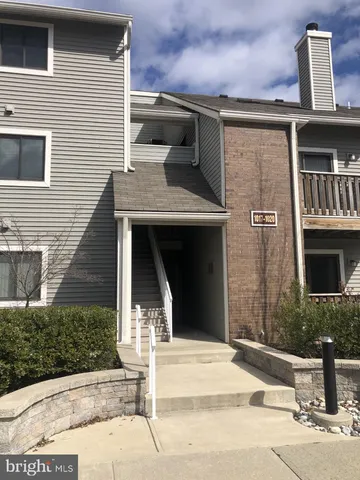 a front view of a house with garage