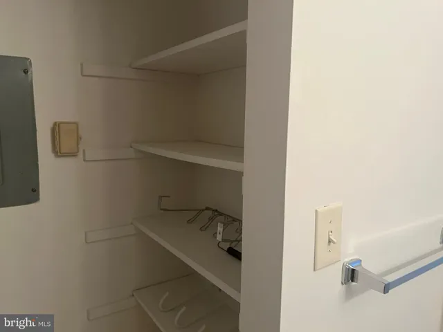 a view of small space with racks on the wall