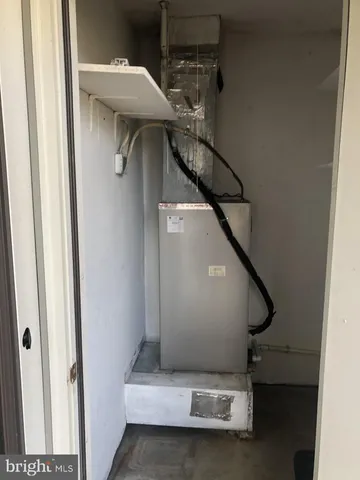 a bathroom with a toilet a sink and shower