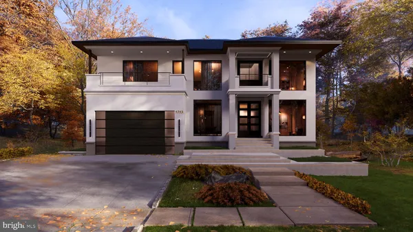 a front view of a house with yard