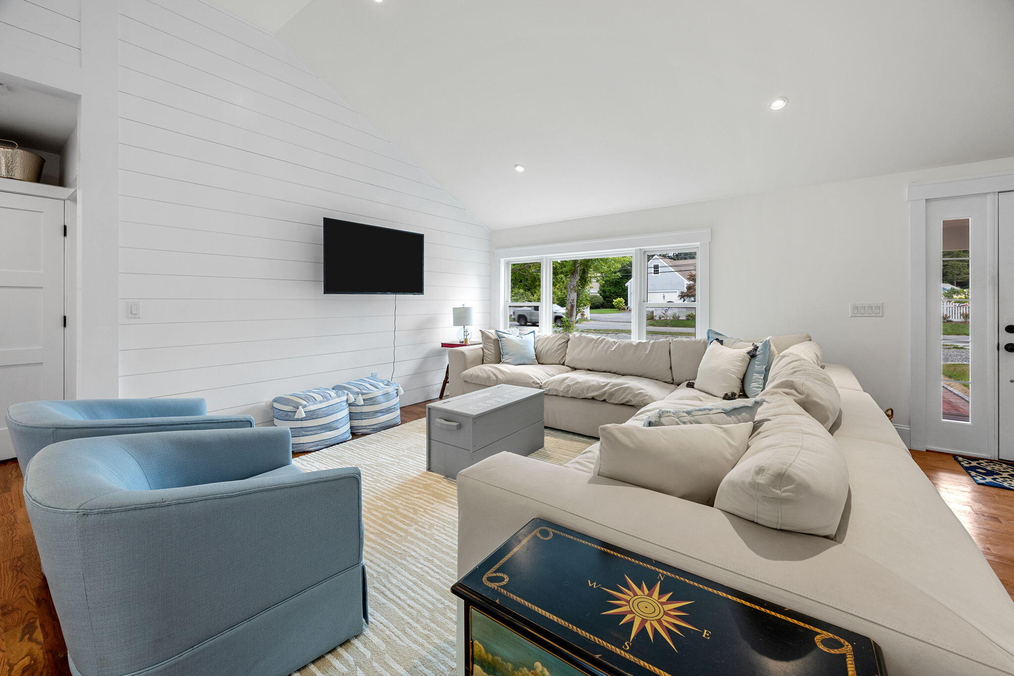 93 Orleans Road Chatham, MA 02633 - Photo 11 of 48 a living room with furniture and a flat screen tv