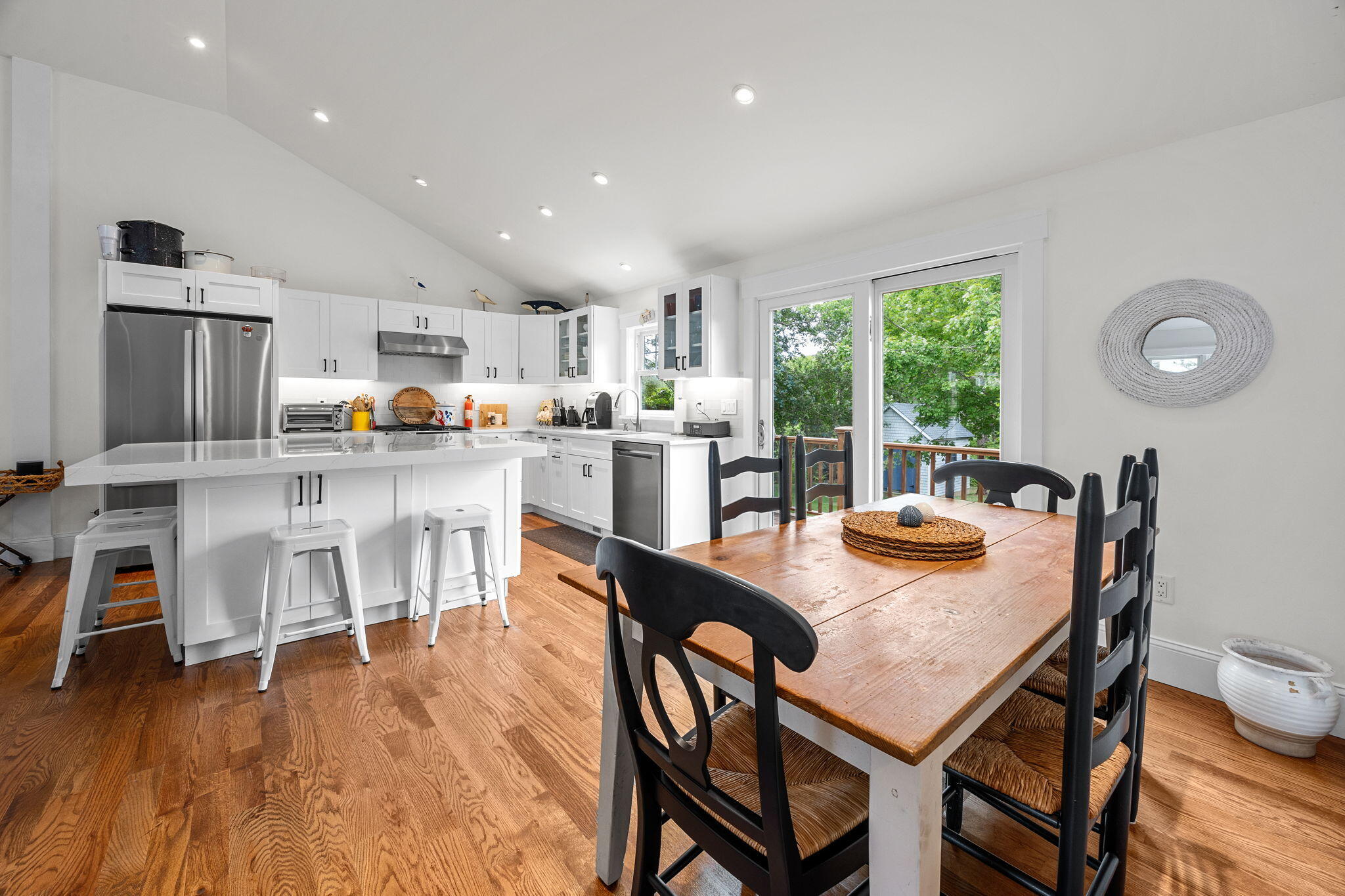 93 Orleans Road Chatham, MA 02633 - Photo 13 of 48 a view of a dining room with furniture window and wooden floor