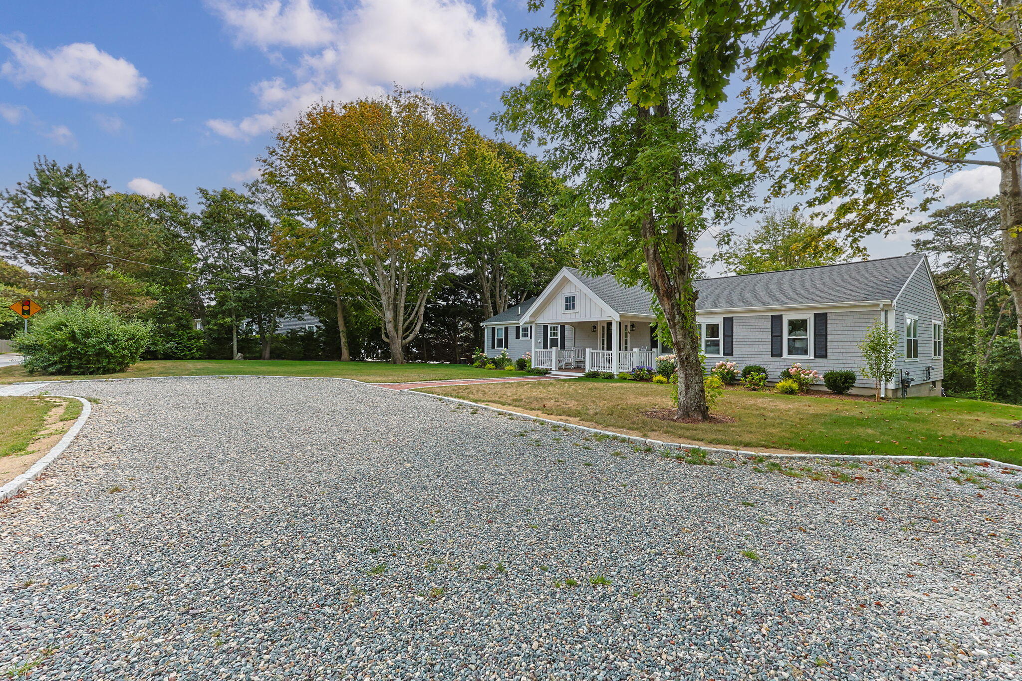93 Orleans Road Chatham, MA 02633 - Photo 2 of 48 a front view of house with yard and green space
