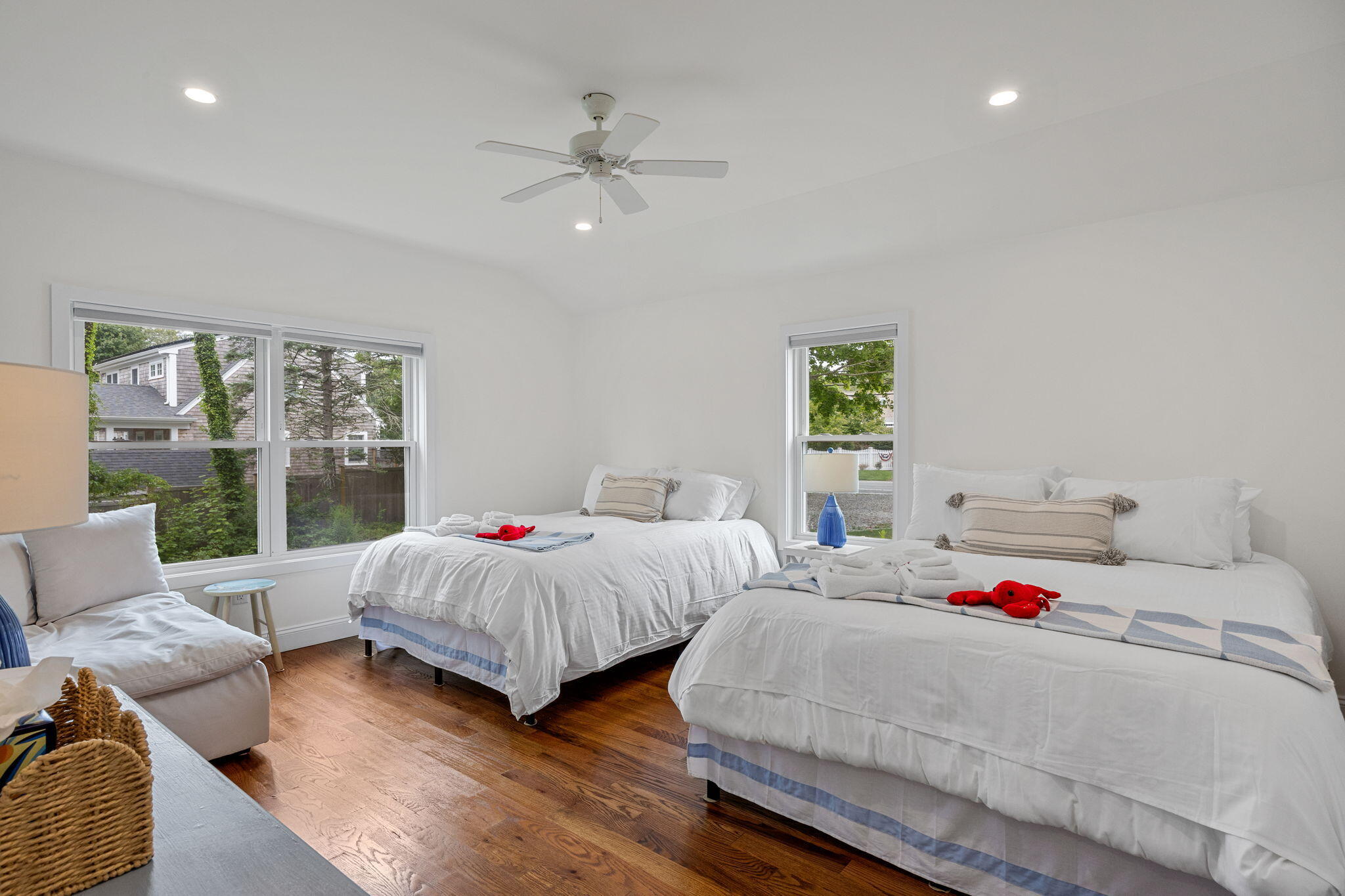 93 Orleans Road Chatham, MA 02633 - Photo 21 of 48 a bedroom with two beds and large window