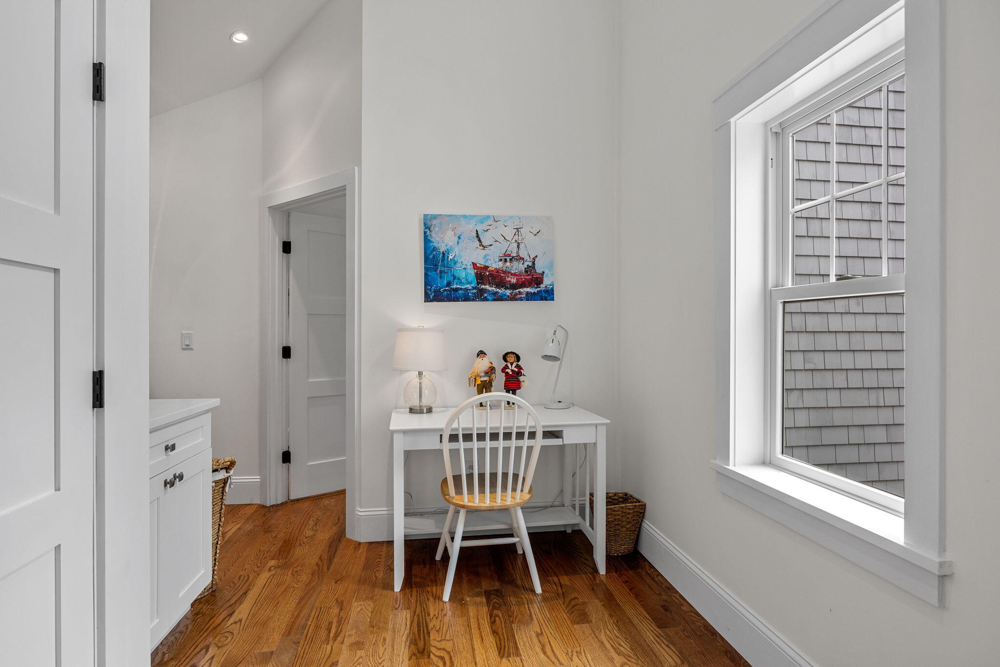 93 Orleans Road Chatham, MA 02633 - Photo 27 of 48 a view of a room with wooden floor and windows