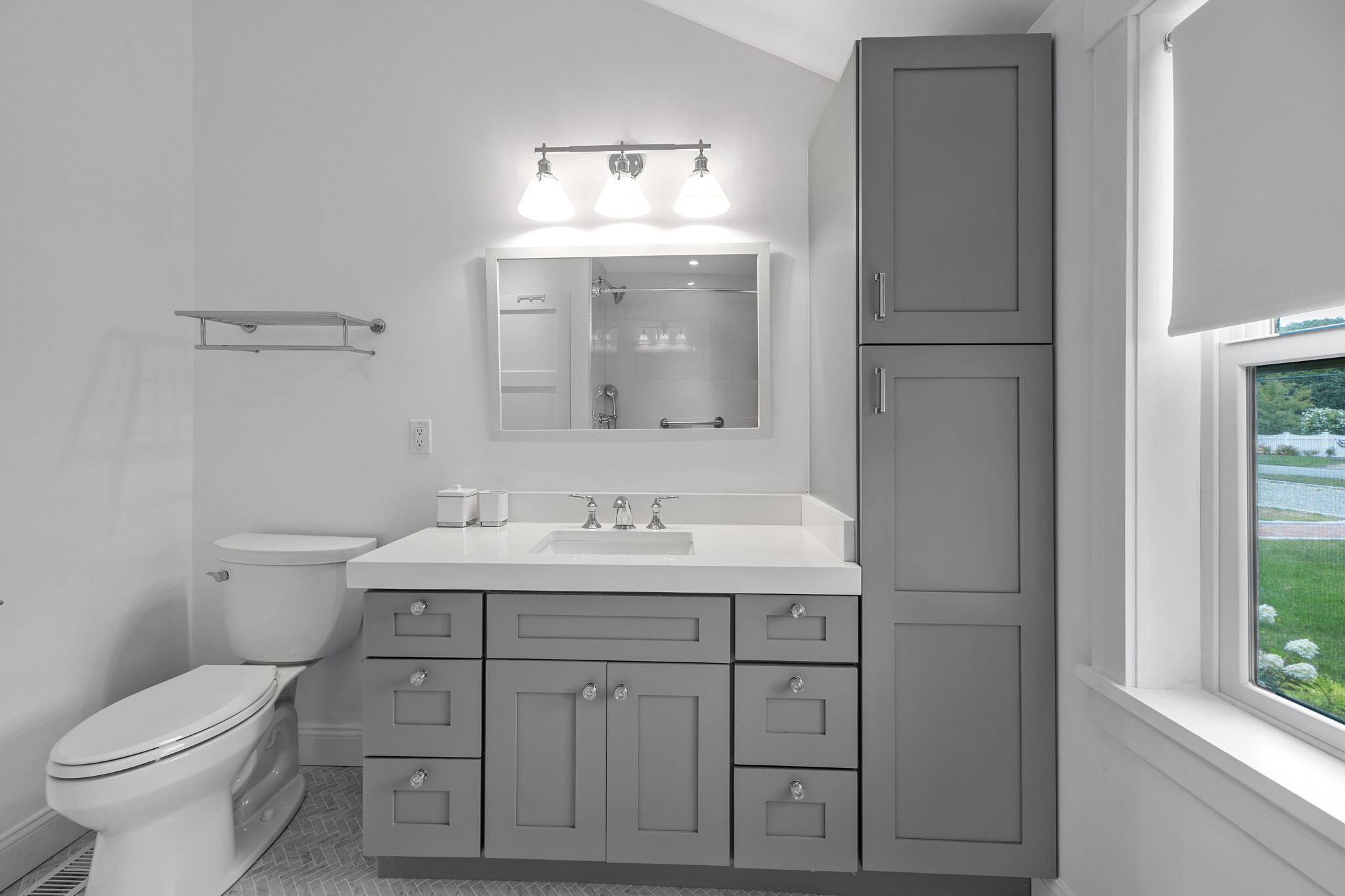 93 Orleans Road Chatham, MA 02633 - Photo 34 of 48 a bathroom with a toilet sink and mirror