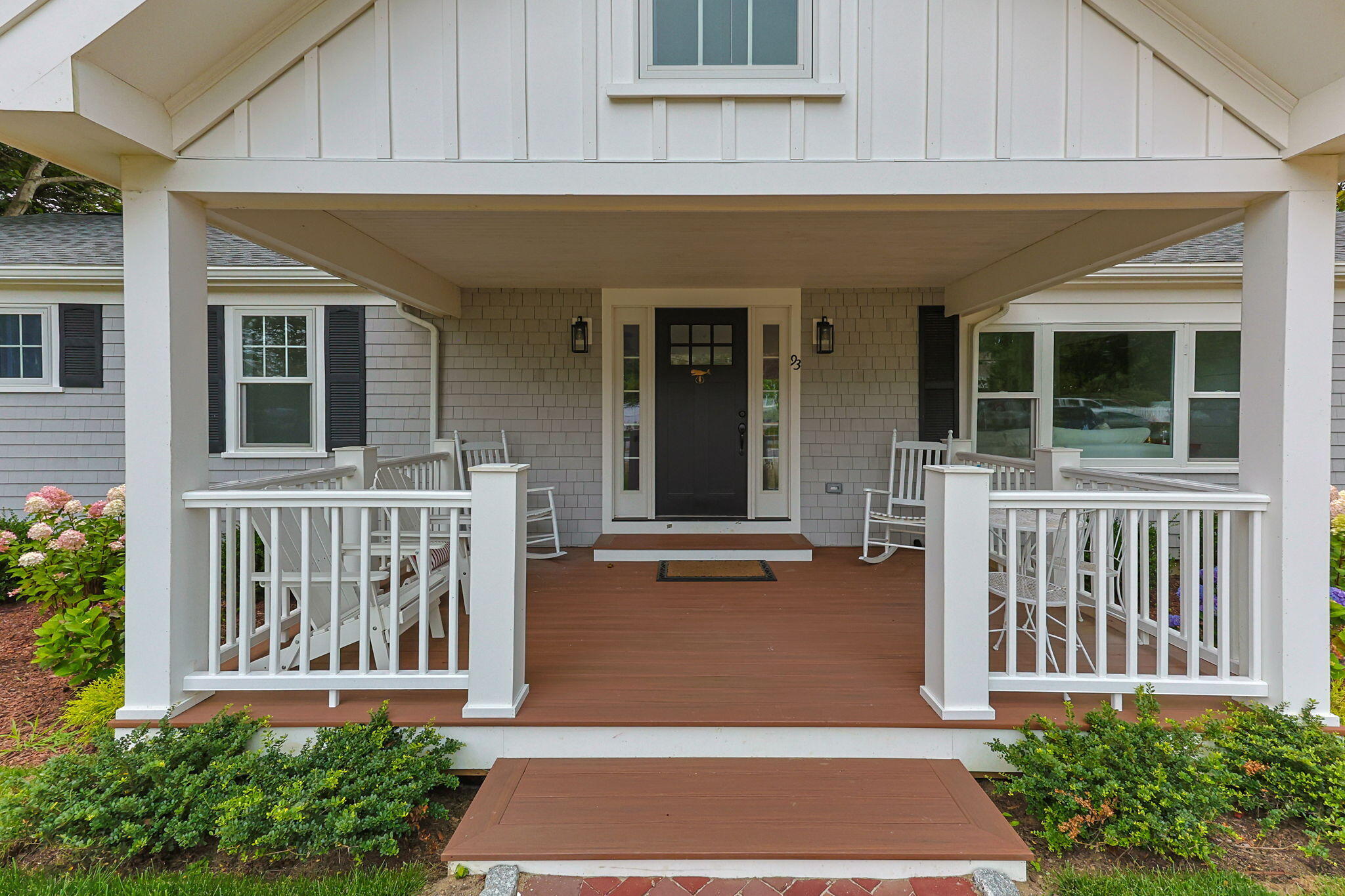 93 Orleans Road Chatham, MA 02633 - Photo 8 of 48 a view of a house with porch and wooden floor