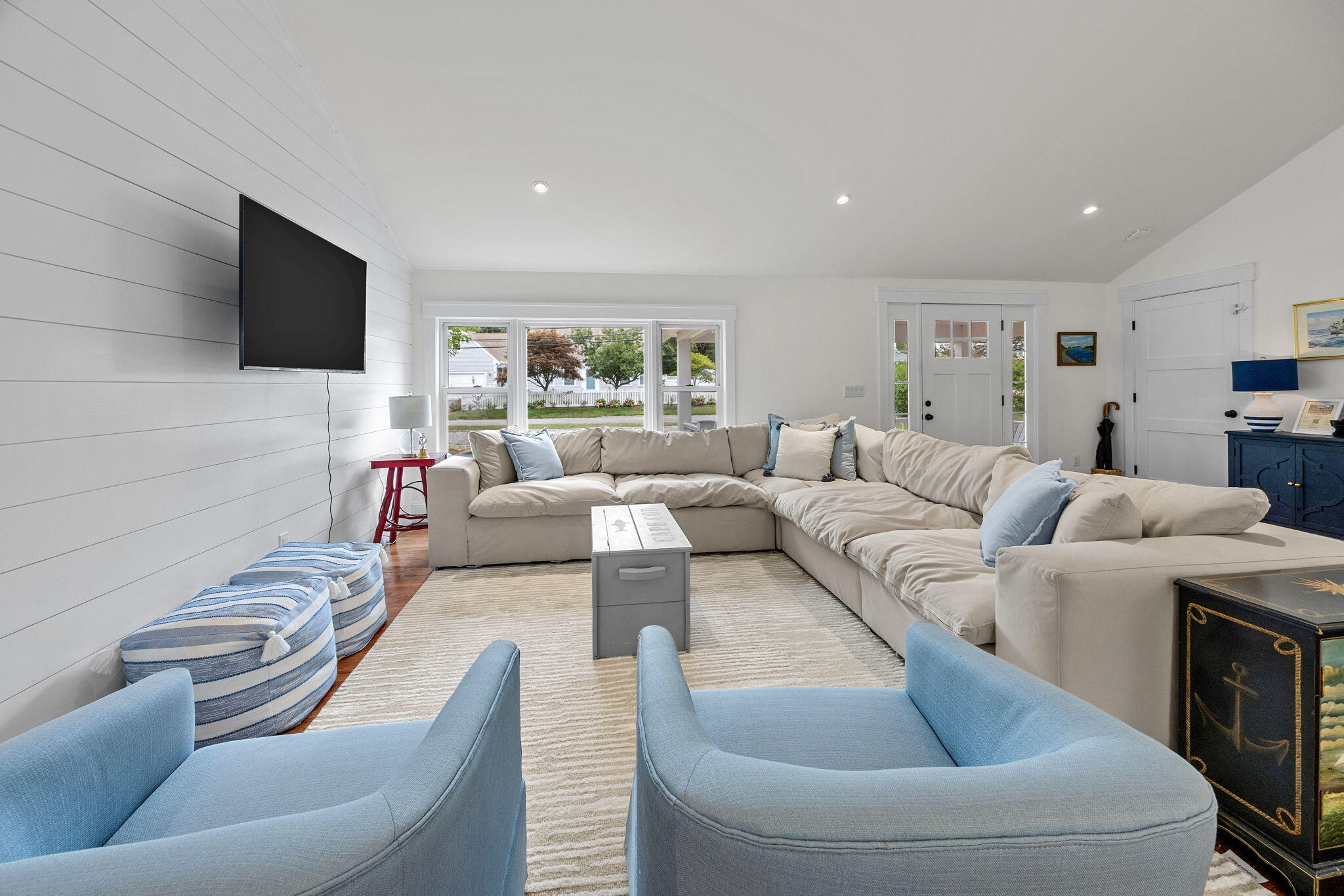 93 Orleans Road Chatham, MA 02633 - Photo 10 of 48 a living room with furniture and a flat screen tv