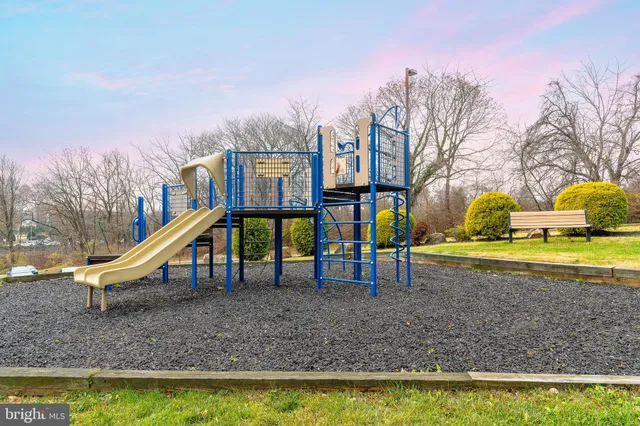 a view of a car parked in front of a house