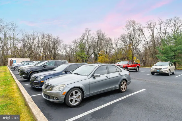 a swimming pool with outdoor seating and yard