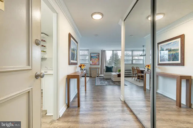 a view of a livingroom with furniture and wooden floor