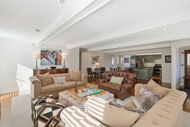 a bathroom with a shower and a glass door