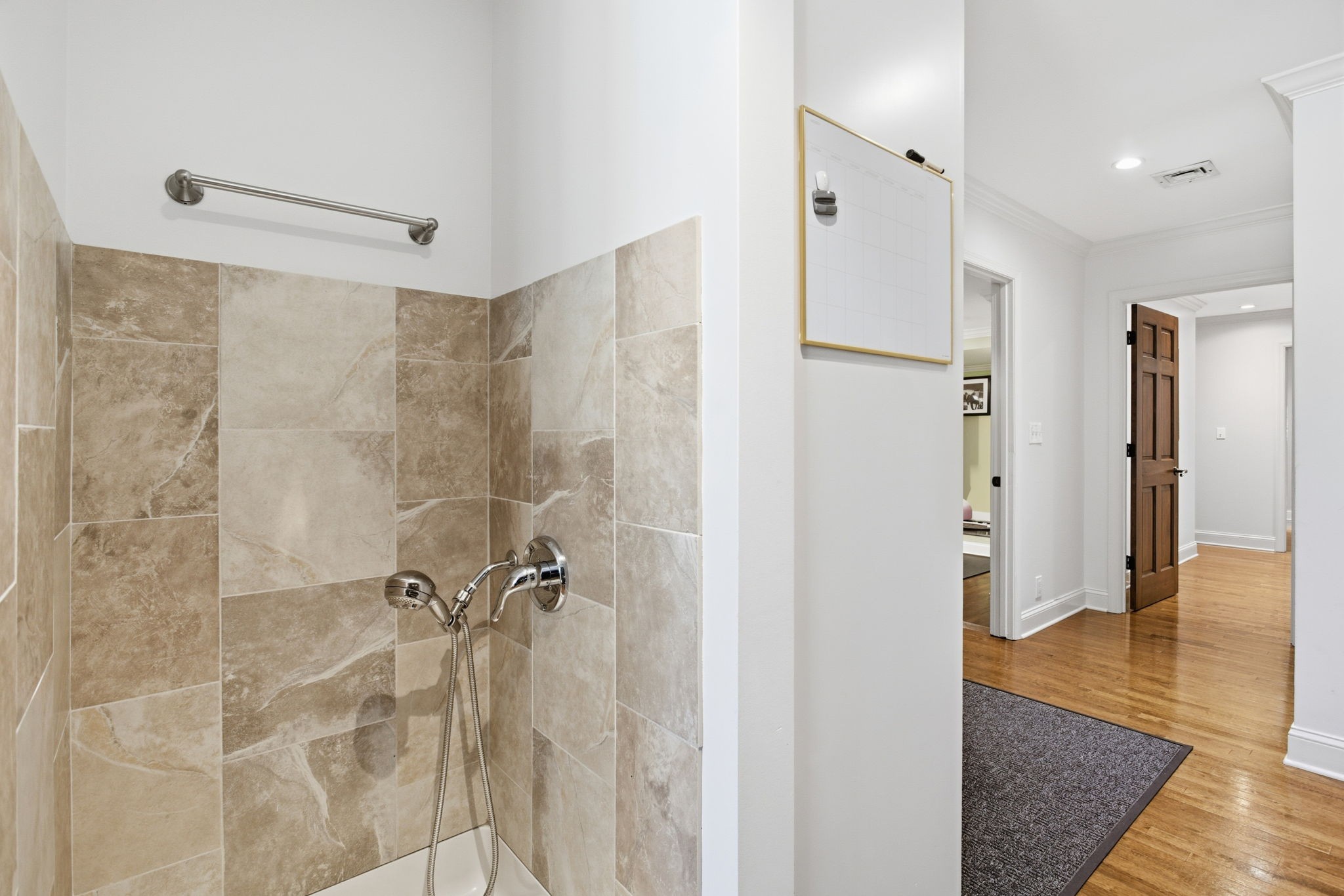 714 Farrell Road Nashville, TN 37220 - Photo 22 of 66 a bathroom with a shower and a glass door