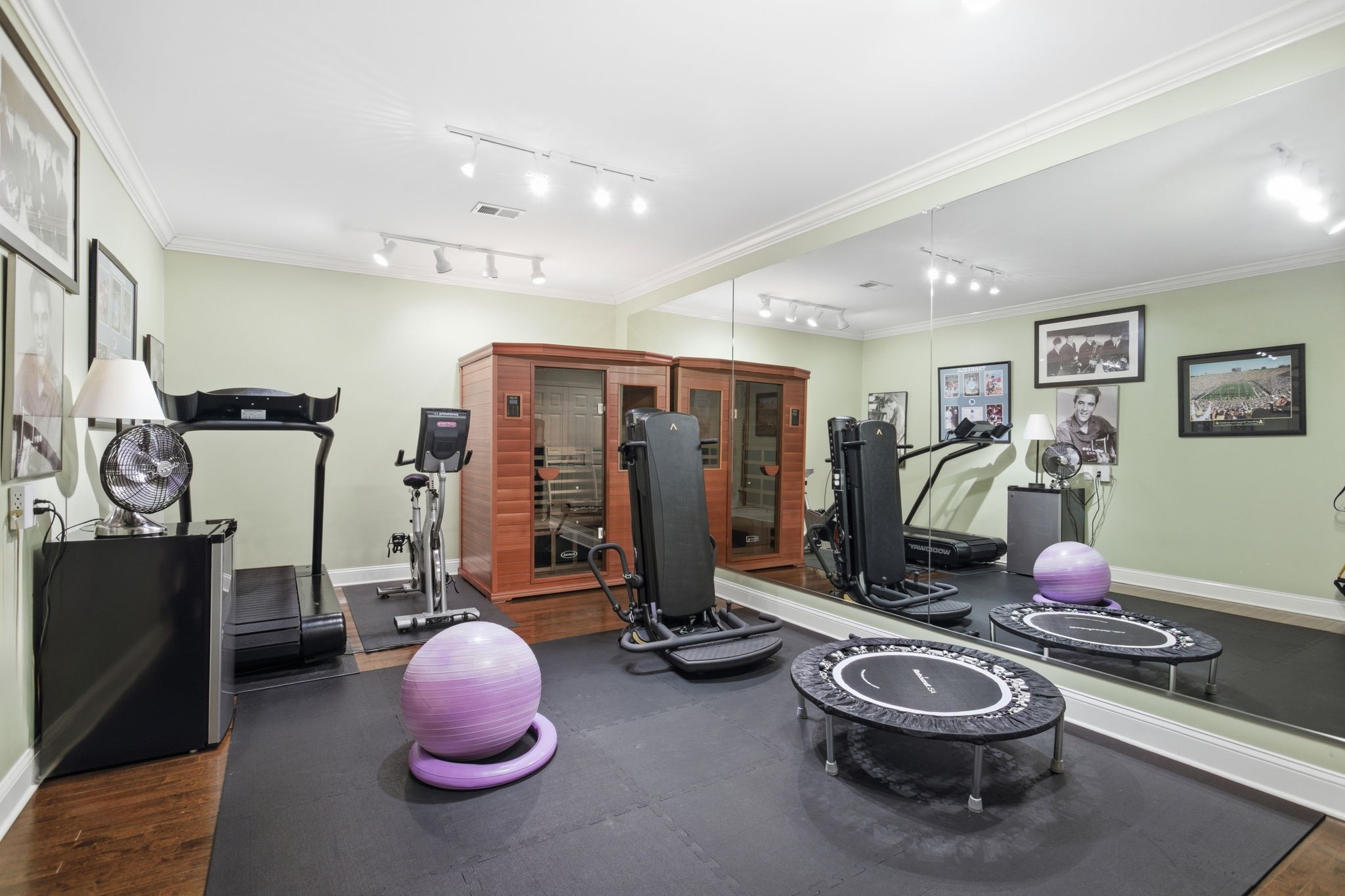 714 Farrell Road Nashville, TN 37220 - Photo 25 of 66 a room with gym equipment and a flat screen tv