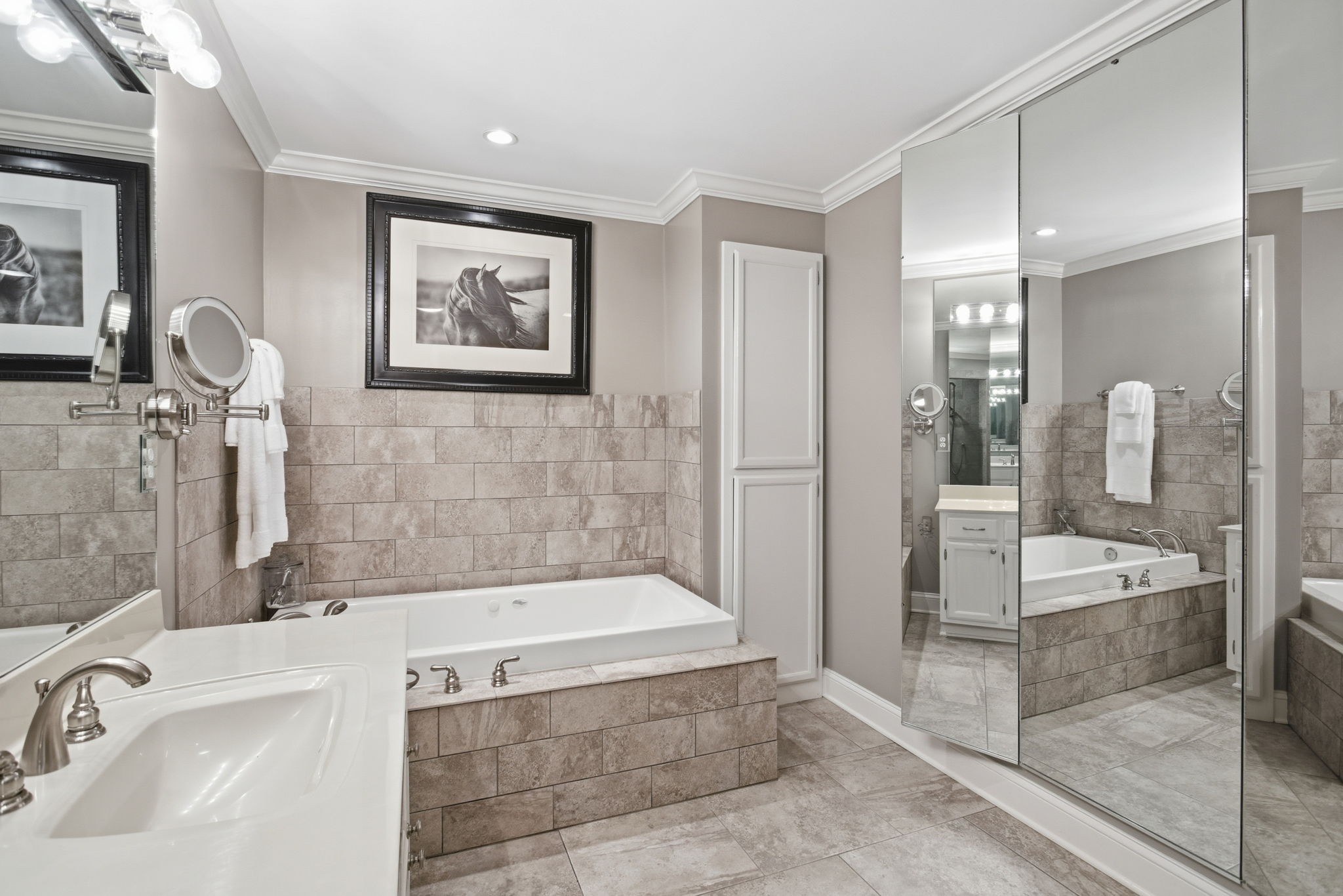 714 Farrell Road Nashville, TN 37220 - Photo 32 of 66 a bathroom with a tub a sink and mirror
